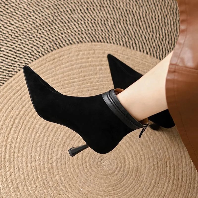 Florimay Laura black ankle boots shown from the back highlighting the heel and sole