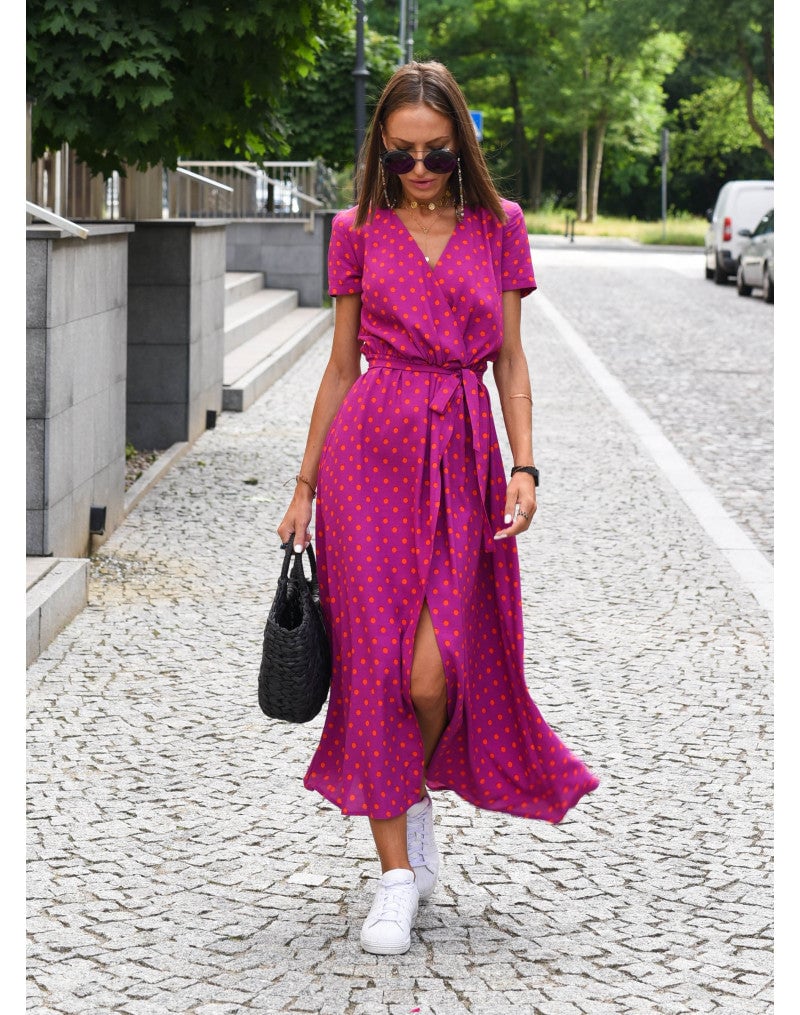 Model wearing the Lauri floral dress paired with strappy sandals for a brunch-ready look