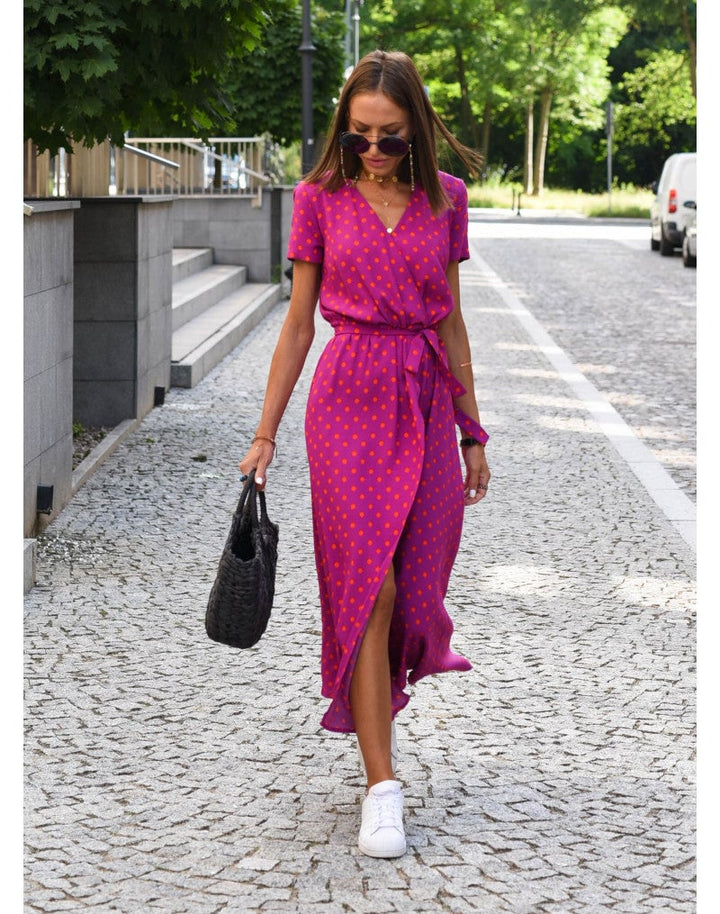 Full-length shot of the Lauri floral dress in pink on a model, perfect for weddings and special occasions