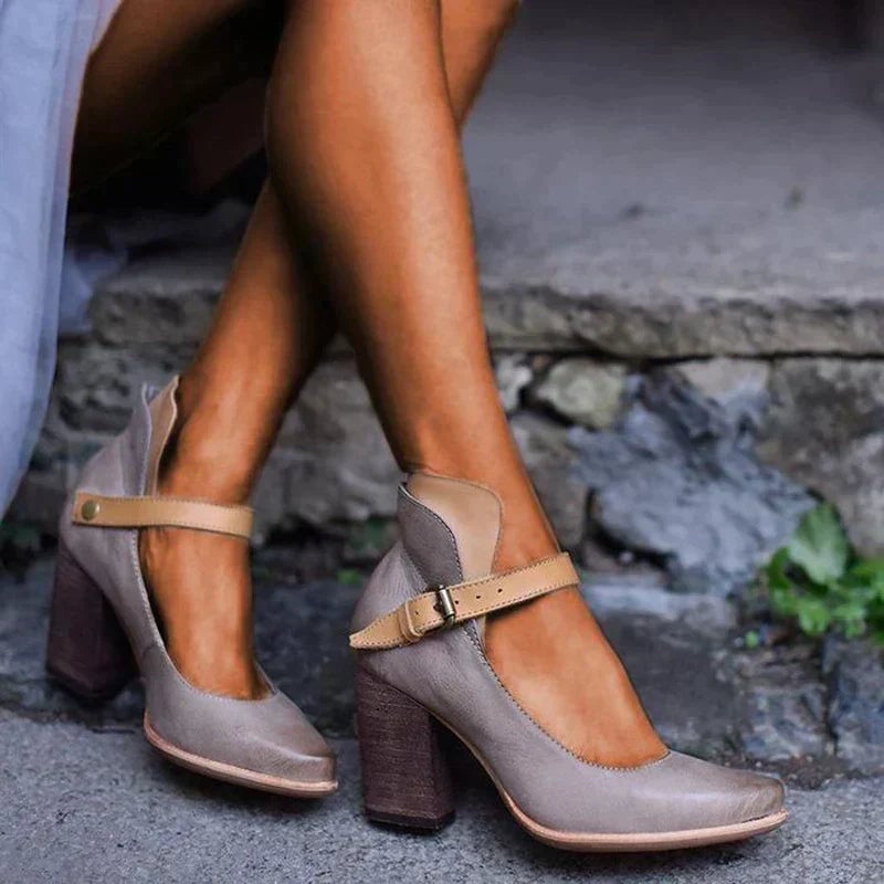 Close-up of cushioned insole and secure strap detail on women's heel sandals
