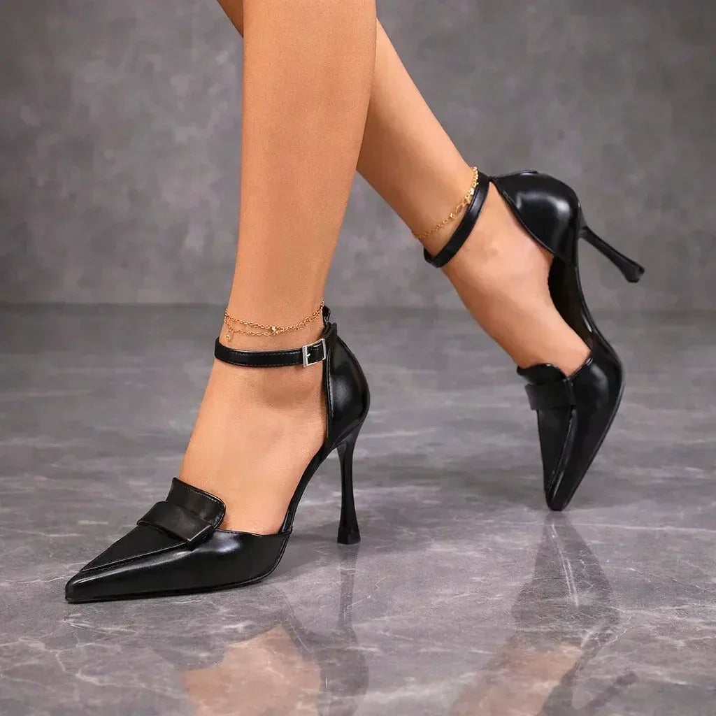 Lavinia brown heels shown from the front highlighting the pointed toe silhouette