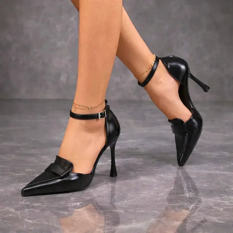 Lavinia brown heels shown from the front highlighting the pointed toe silhouette
