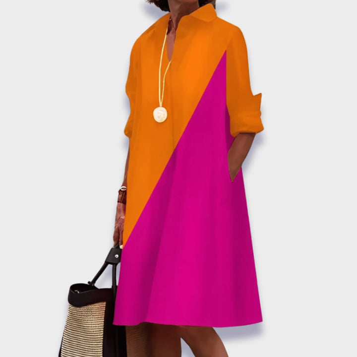 Model wearing a midi polo dress showing the relaxed fit and feminine silhouette from the front