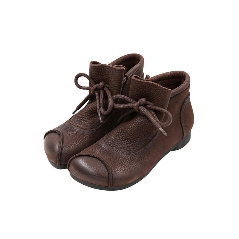 Lena comfort boots in black styled with a flowy dress for a chic casual look