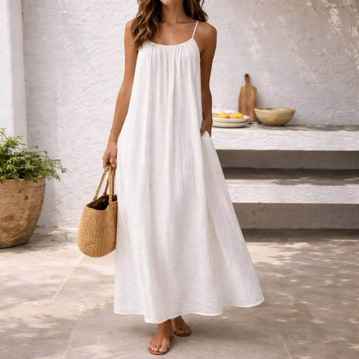 Front view of the Lena maxi sundress in white showing gathered scoop neckline and adjustable straps