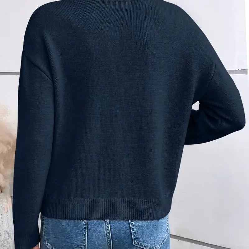 Leonie sweater in pink styled for a feminine, elevated evening look
