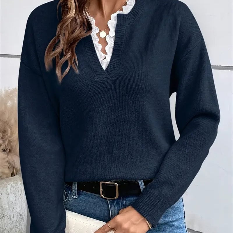 Detail shot of Leonie sweater neckline and shoulder seam in navy blue