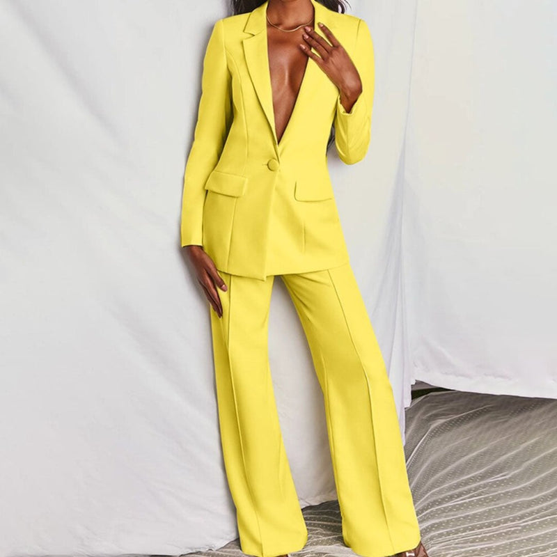 Model wearing a yellow structured blazer and high-waisted trousers two-piece set from Florimay