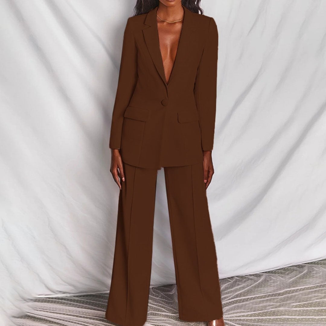 Model wearing the light pink Florimay blazer and trousers set for a soft, feminine look