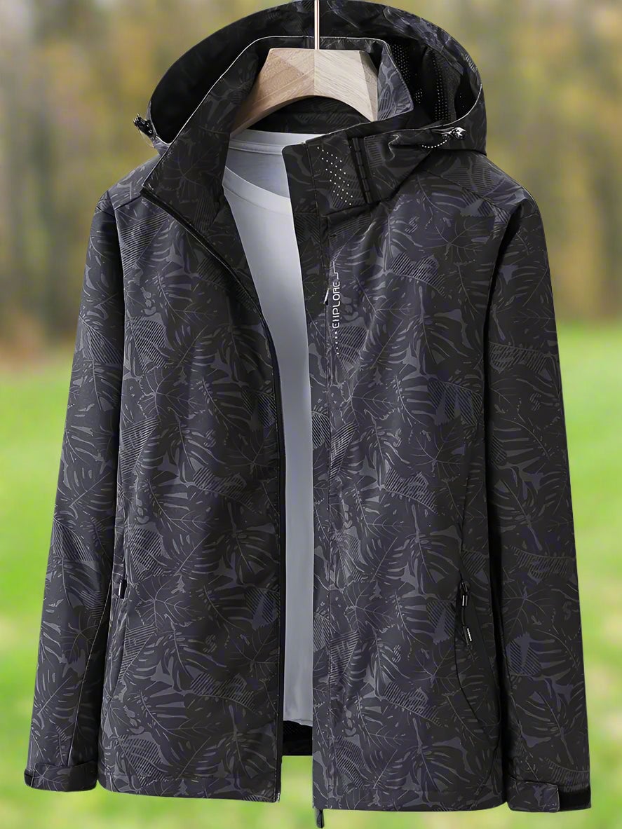 Detail shot of the drawstring waist and sealed seams on a women's waterproof summer jacket
