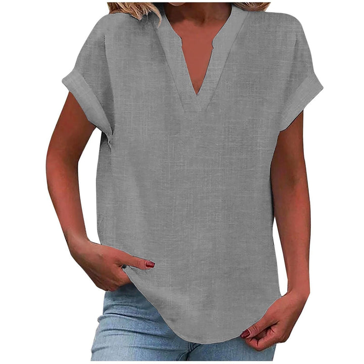 Lexi blouse in pink displayed to show relaxed fit and short sleeve design