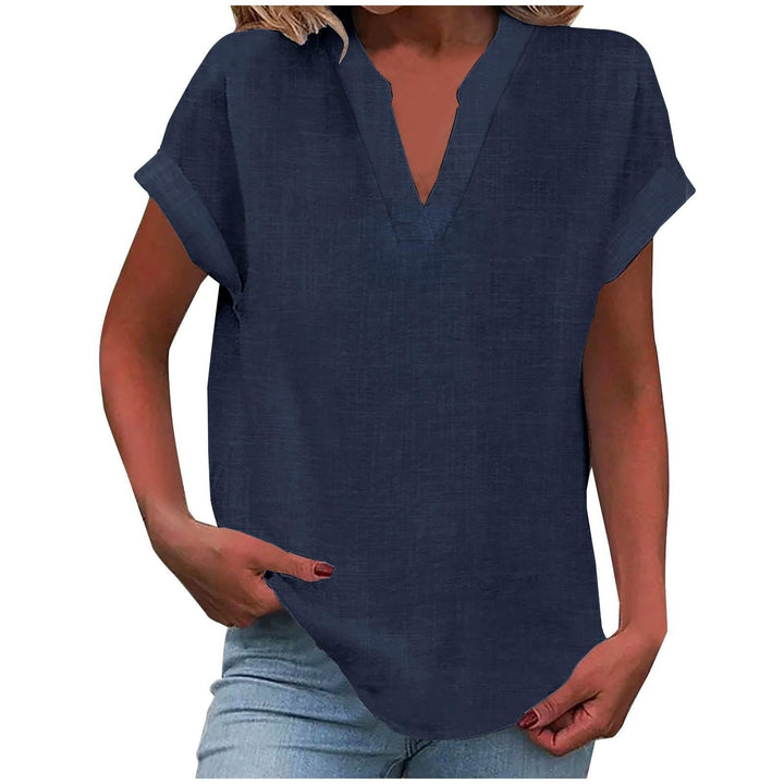 Size range display of the Lexi relaxed V-neck blouse from S to 4XL