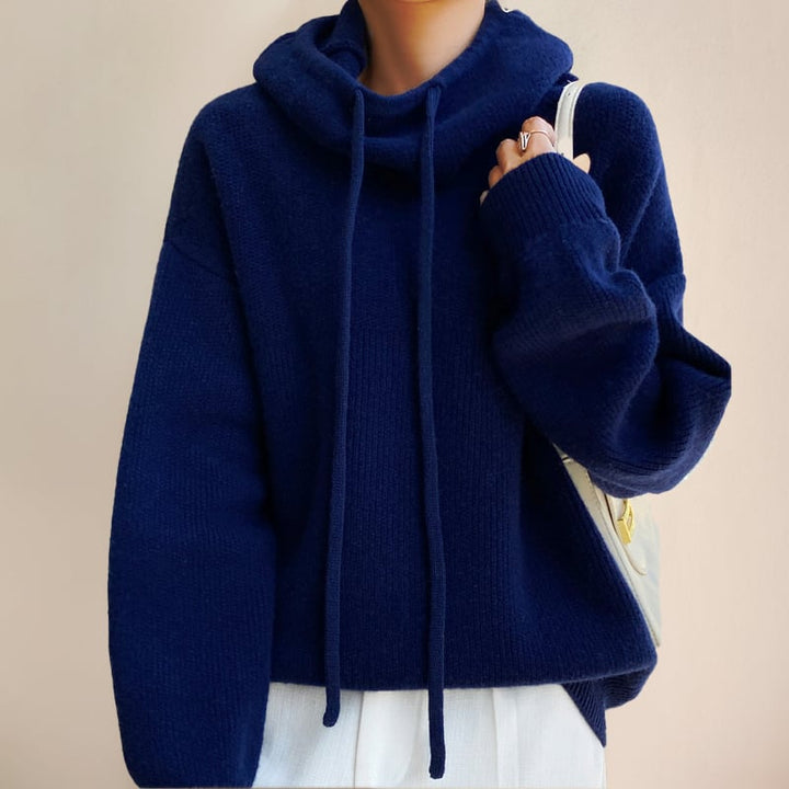 Flat lay of the Luna hoodie in all four color options: green, brown, dark blue, and blue