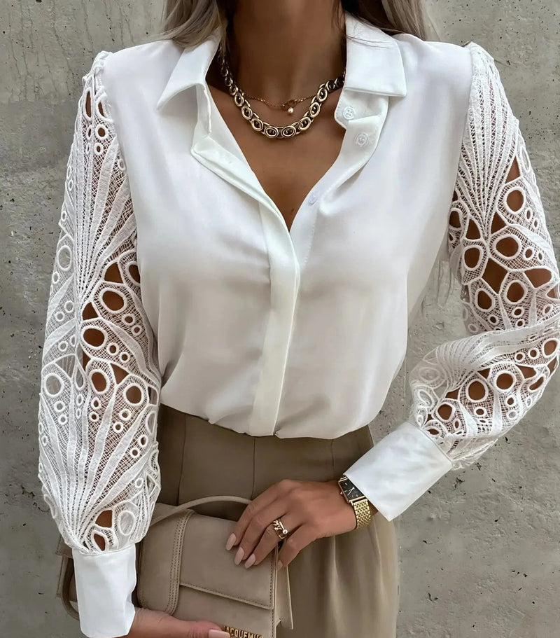Front view of a sophisticated women's blouse with delicate lace sleeves in white, worn casually styled