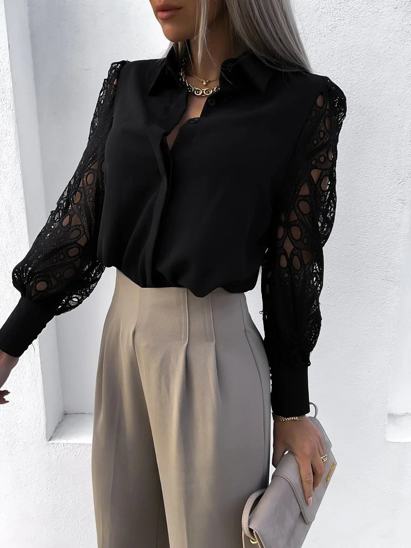 Side profile of a women's sophisticated blouse with lace sleeves in classic white