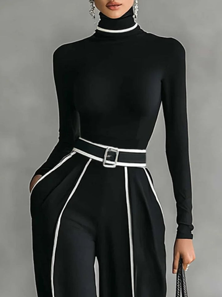 Side view of wide-leg pants from gray high-neck top and pants set with matching belt