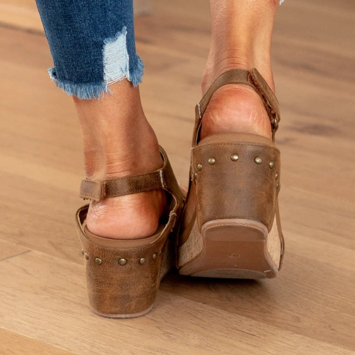 Linda wedge sandals in brown displayed at an angle showing full silhouette
