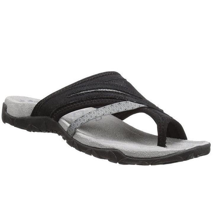 Close-up of Linden slippers' padded insole and arch support structure