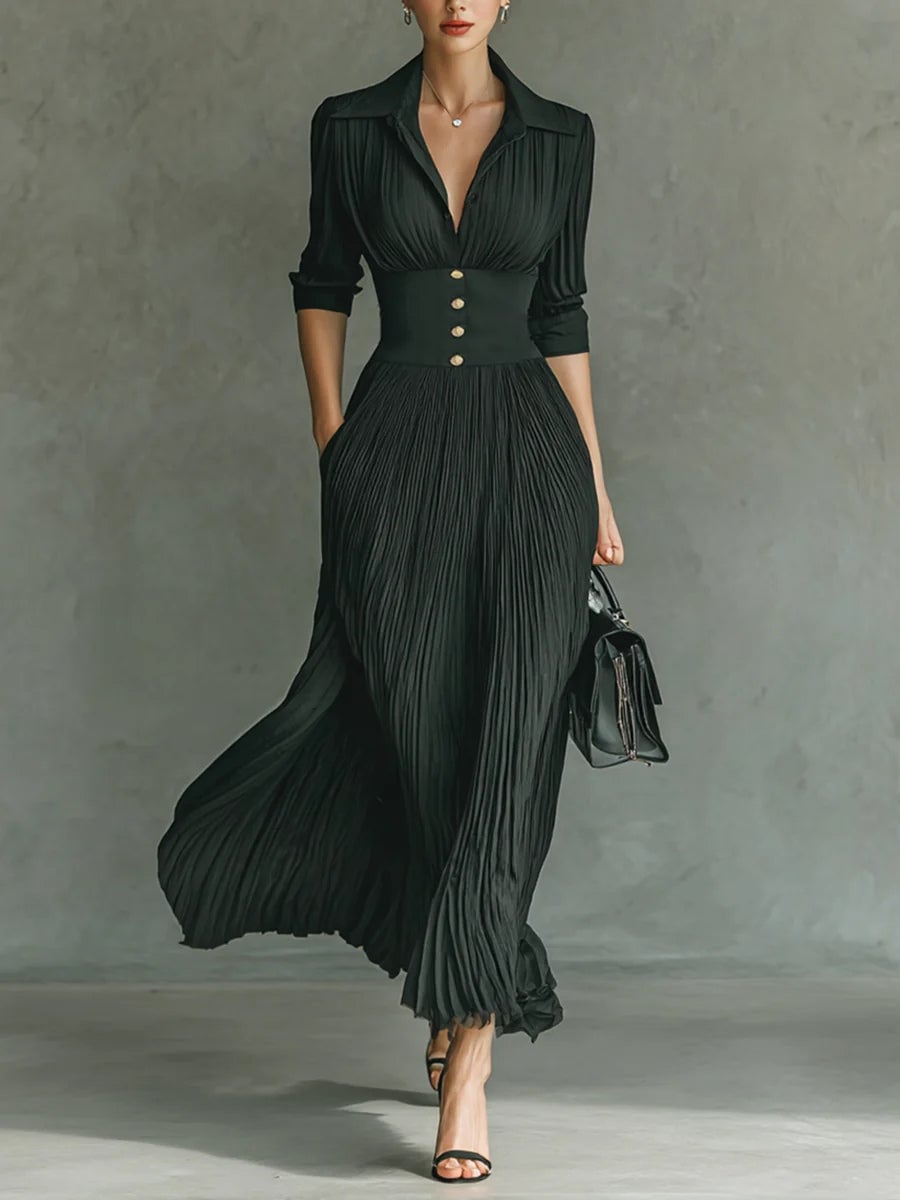 Black long-sleeve pleated lapel maxi dress with belted waist, front view on model