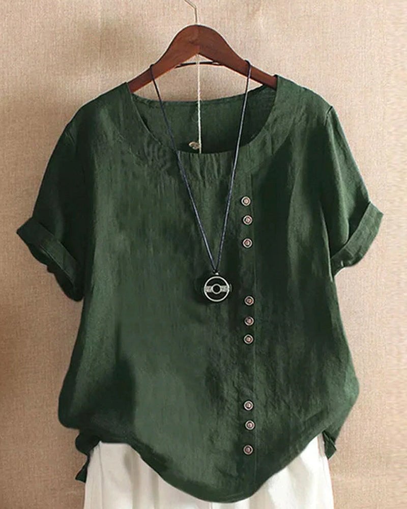 Women's linen short sleeve top in brown with relaxed silhouette, front view on model