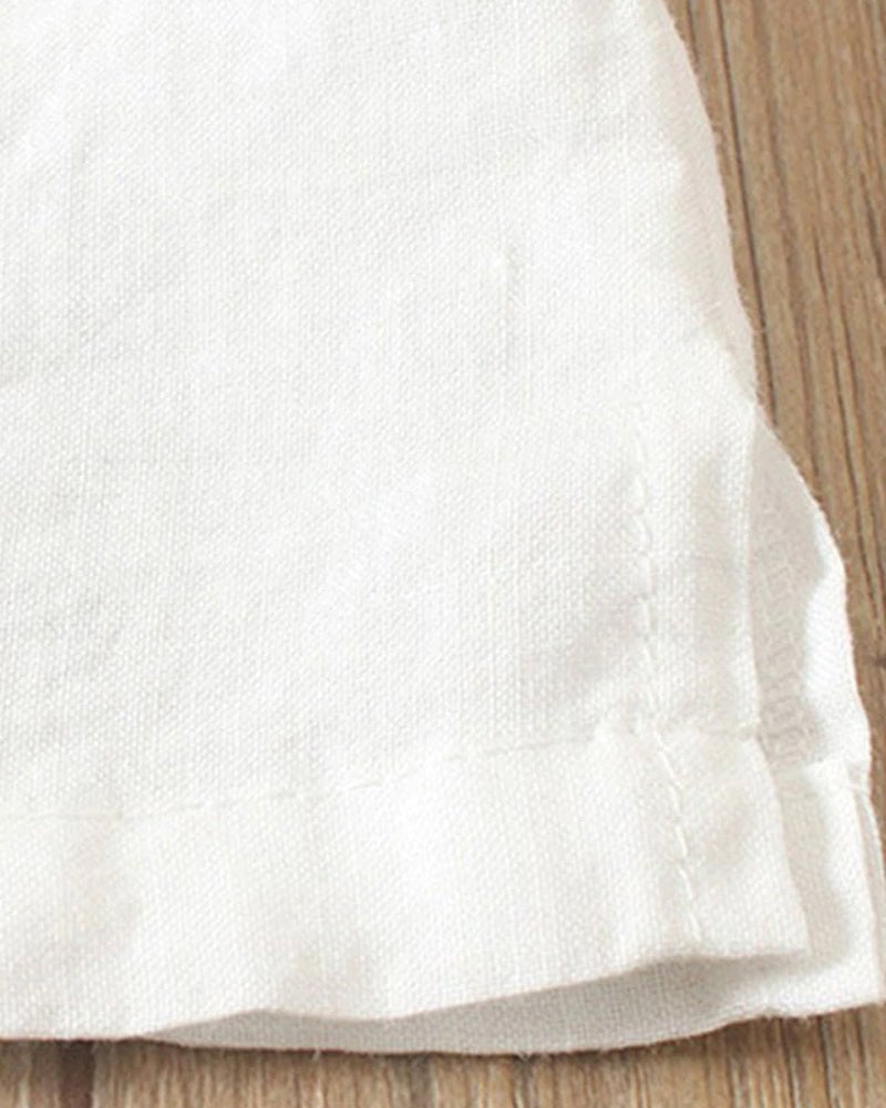 Flat lay of women's linen button-front top showing all five color options: pink, white, brown, blue, and green