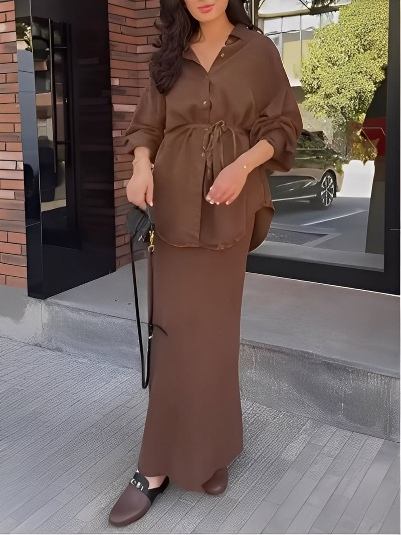 Close-up of the tie-drawstring waist detail on the two-piece shirt and skirt set