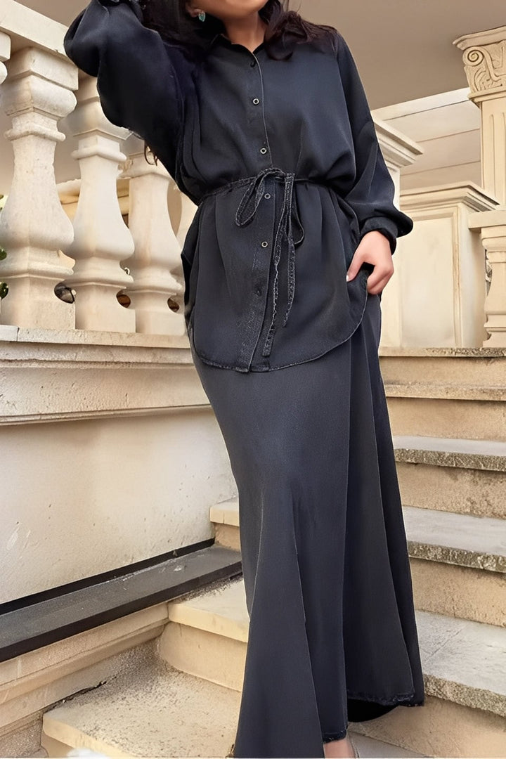 Side view of the coordinated shirt and skirt set highlighting the relaxed silhouette