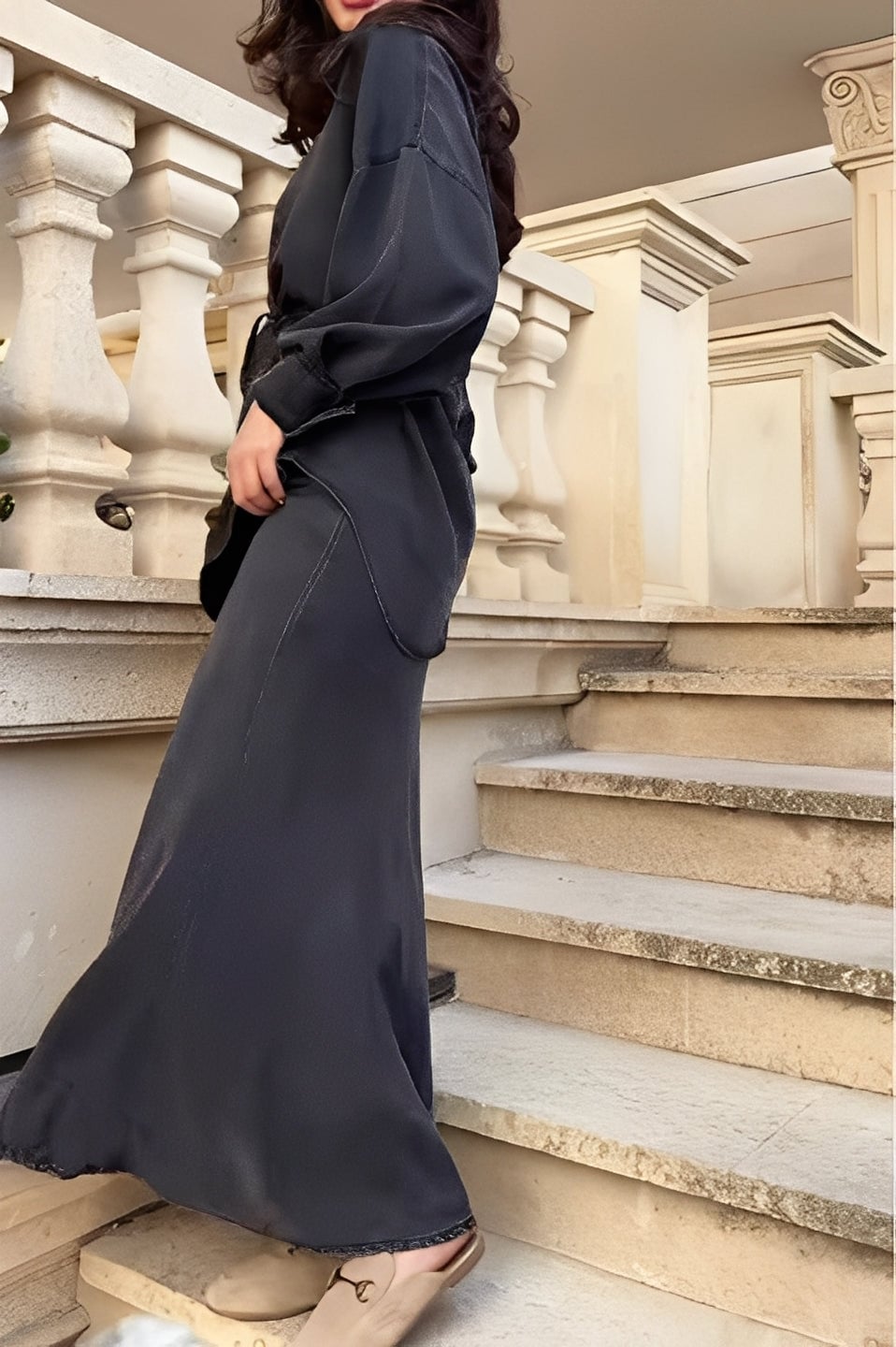 Flat lay of the long-sleeve shirt and skirt set showing fabric texture and color