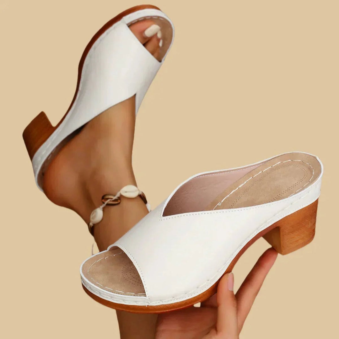 Lisa sandal in silver colorway displayed on a clean white background