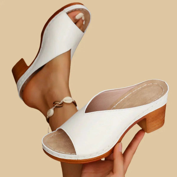 Lisa sandal in silver colorway displayed on a clean white background