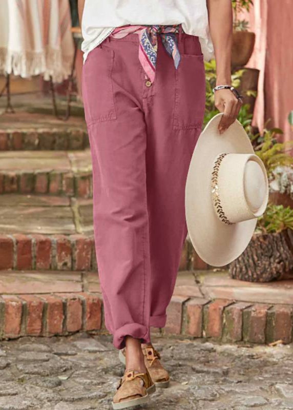 Green relaxed high-waist trousers in a breathable fabric on a model