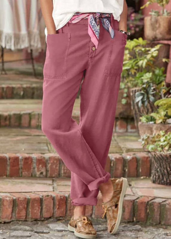 Black elegant high-waist trousers with subtle pleats styled for day-to-night wear
