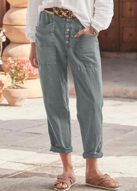 Close-up of waistband and pleat detail on Florimay relaxed trousers