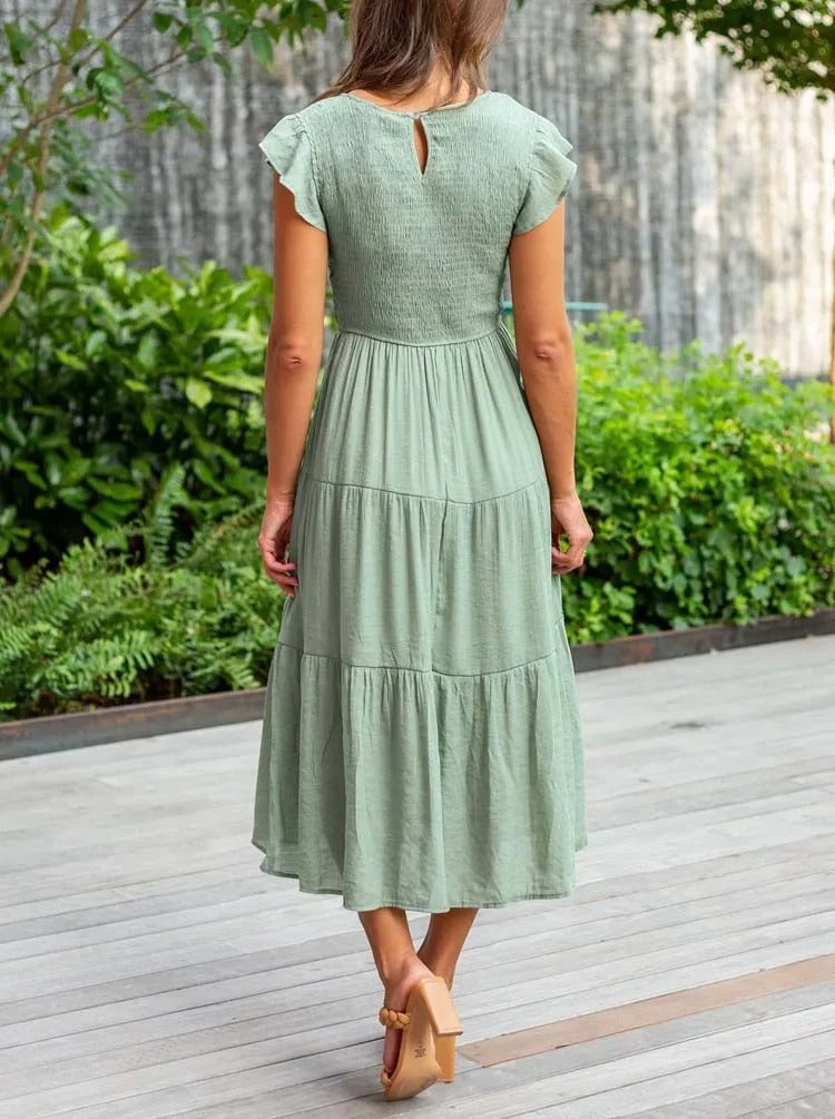 Full-length front view of the Lisette tummy control dress in pink