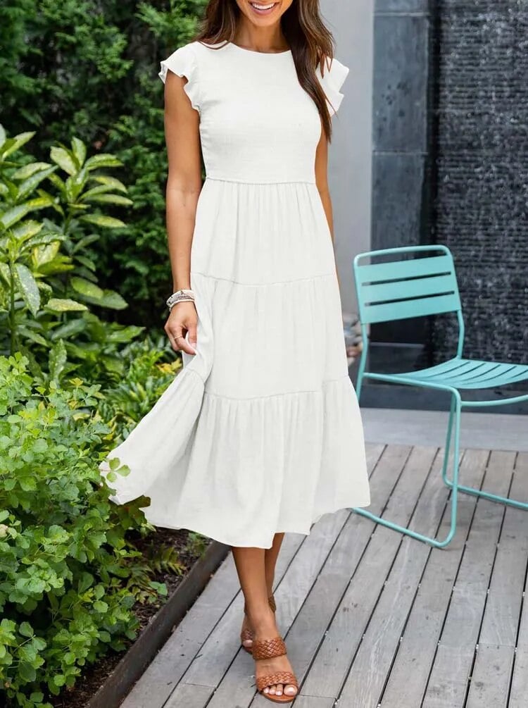 Front view of the Lisette tummy control draped dress in green