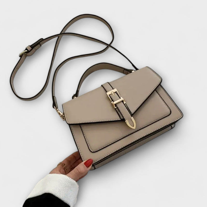 Liv Classic Shoulder Bag in black with elegant buckle hardware and adjustable strap, front view
