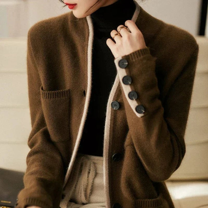 Woman wearing the Londyn vintage cardigan in brown, styled with jeans for a casual everyday look