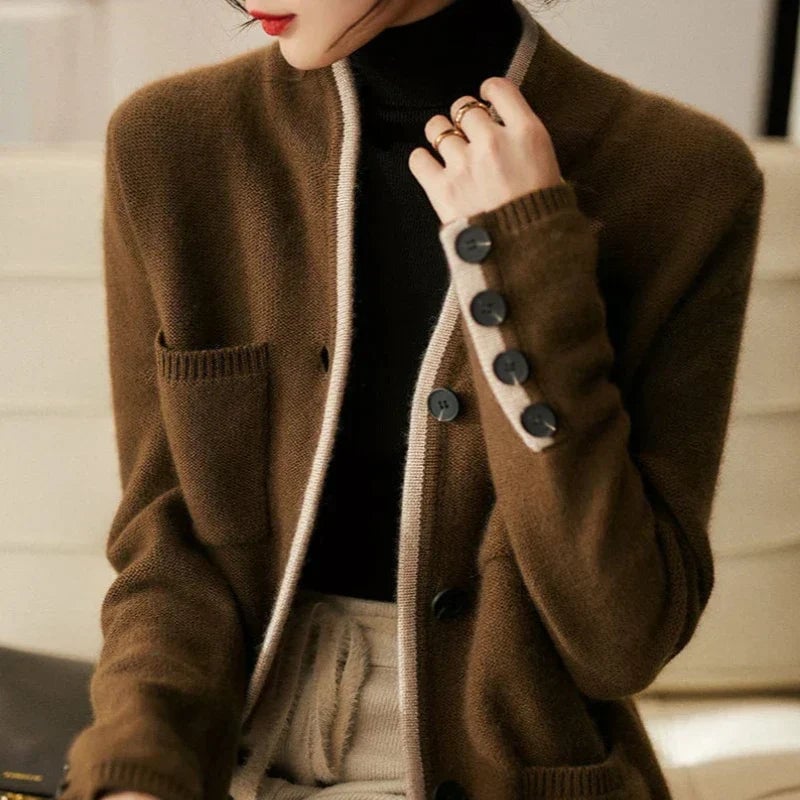 Woman wearing the Londyn vintage cardigan in brown, styled with jeans for a casual everyday look