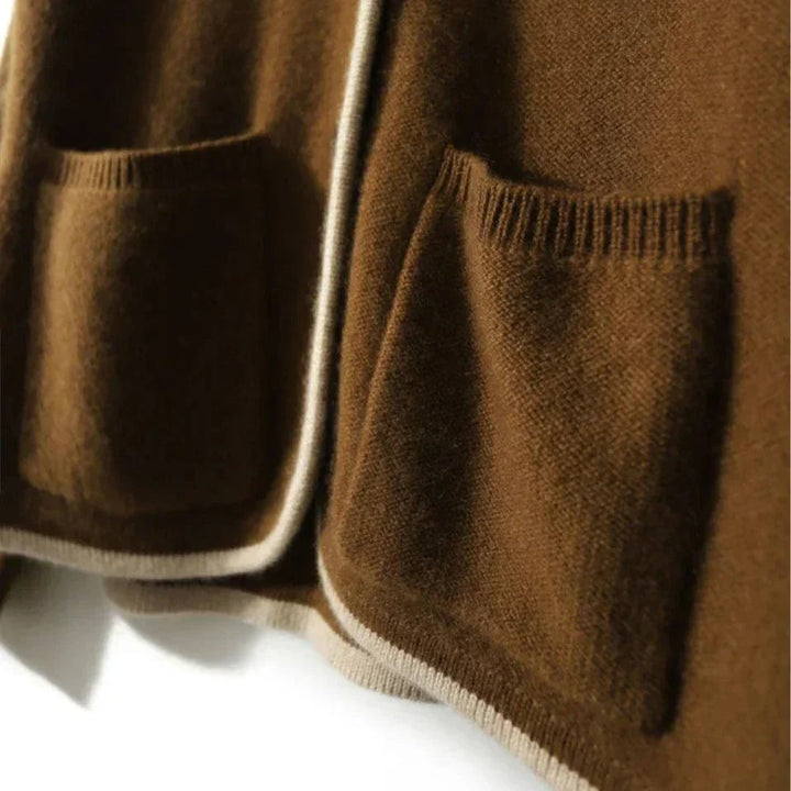 Back view of the Londyn vintage cardigan in beige highlighting the flattering relaxed silhouette