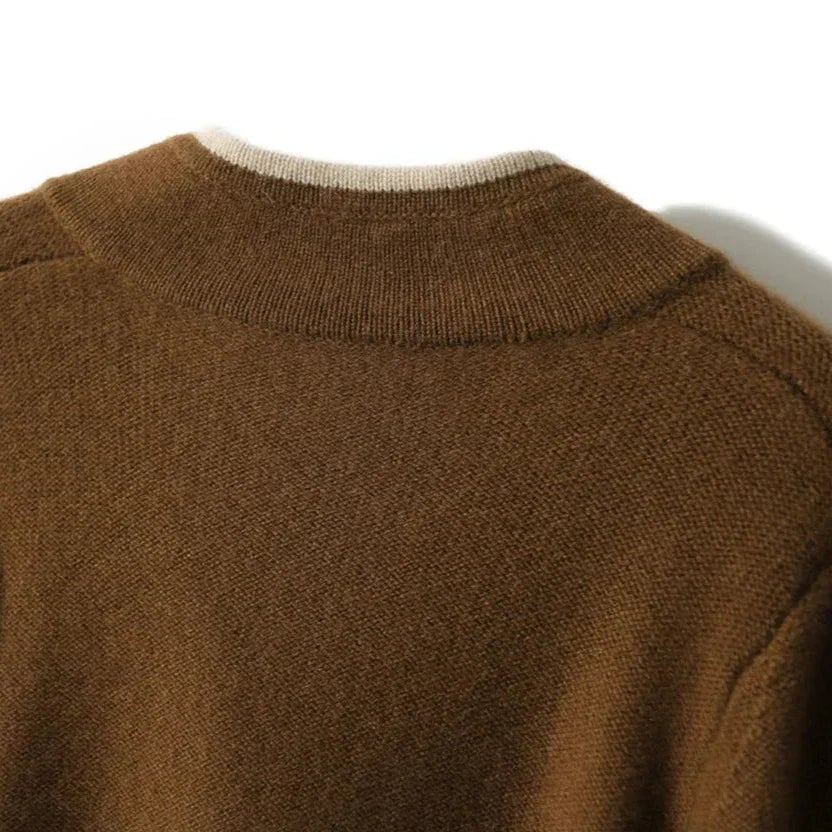 Full-length shot of the Londyn vintage cardigan in brown worn over a white tee and denim