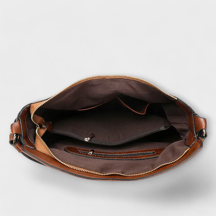 Lora shoulder bag in red against clean white background showing front profile