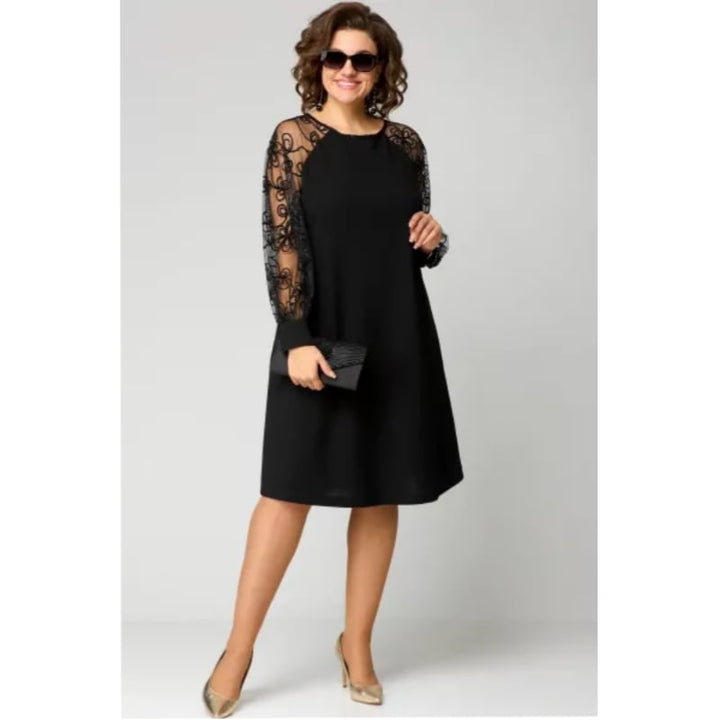 Front view of the Loretta elegant lace dress with long lace sleeves and a flattering feminine silhouette