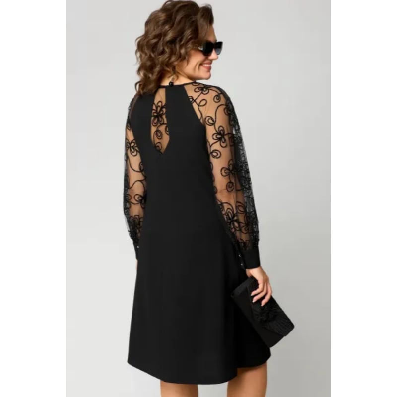 Close-up of the intricate lace sleeve detail on the Loretta elegant dress