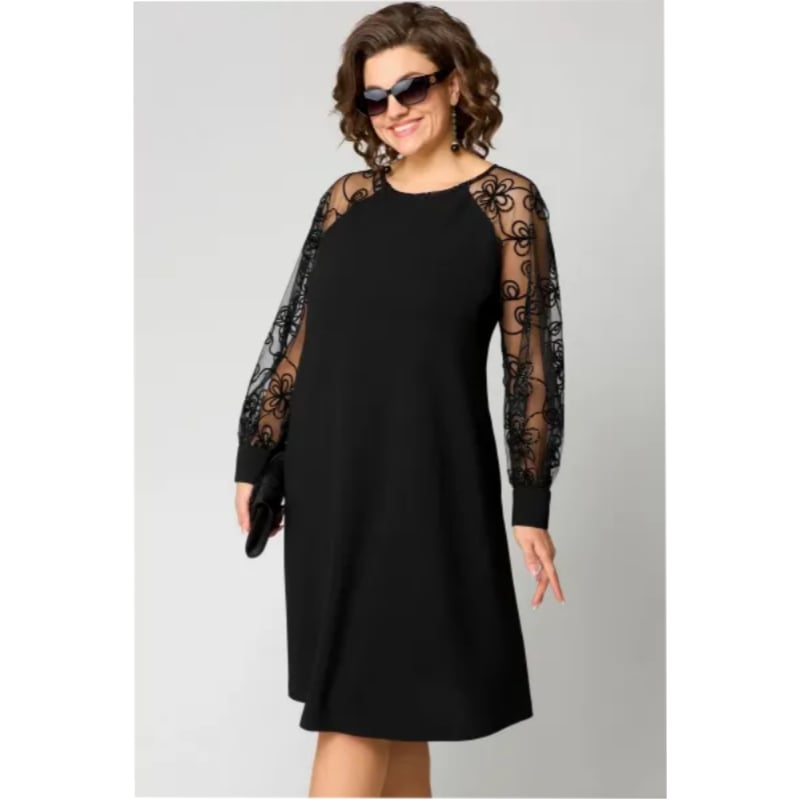 Model wearing the Loretta lace dress styled with heels for a special occasion look