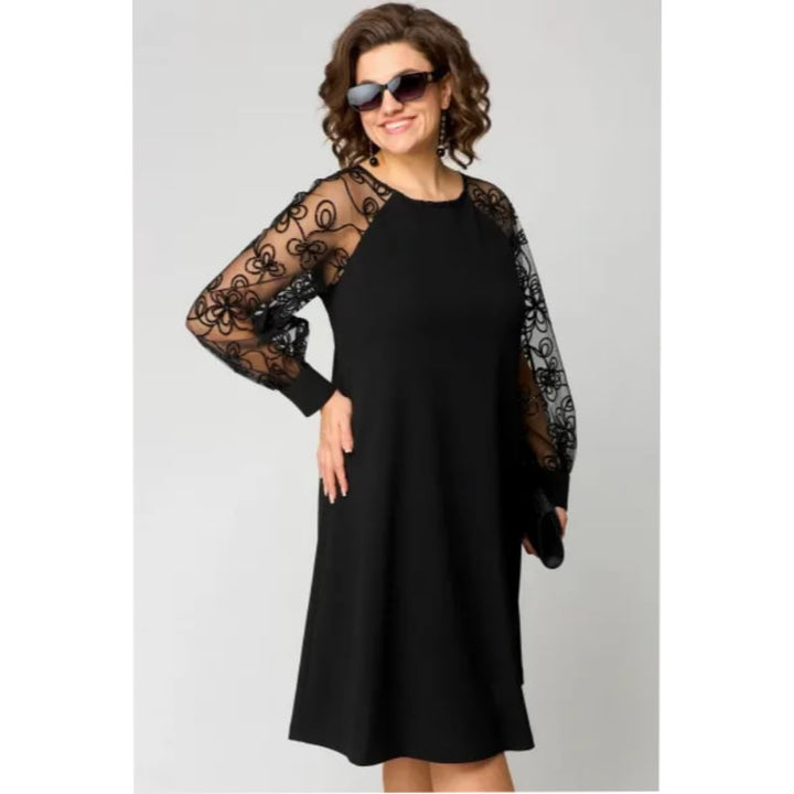 Back view of the Loretta elegant lace dress highlighting the figure-flattering silhouette