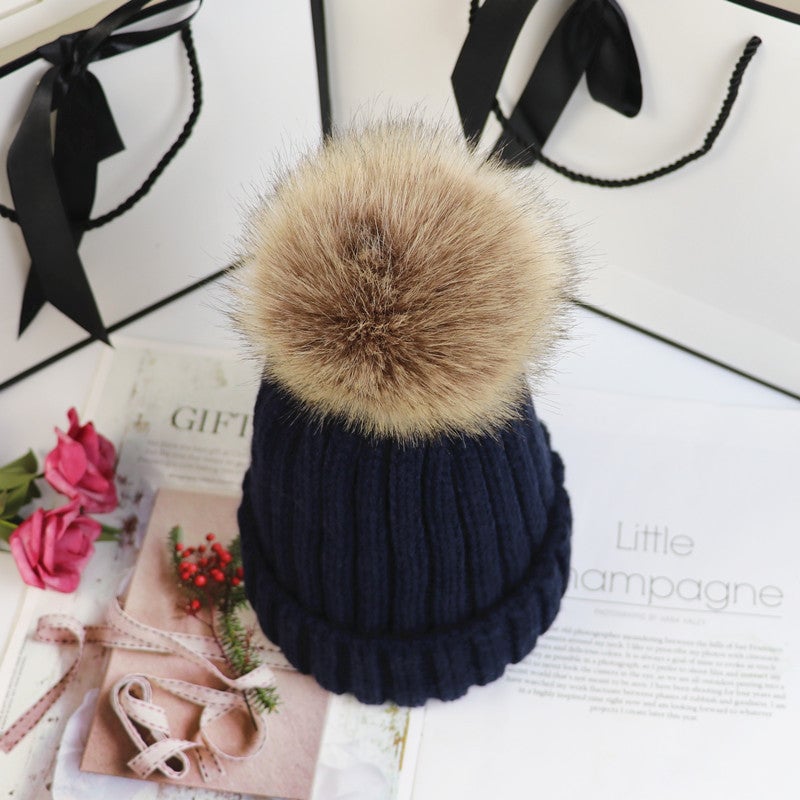 Overhead flat-lay of the Lorette beanie in brown showing knit texture