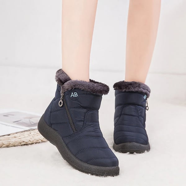 Rear view of Lori OrthoFit women's winter boot in red highlighting mid-calf height