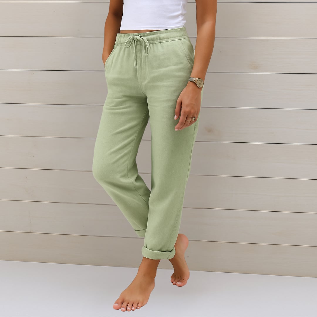 Full-length view of breathable pants showing relaxed silhouette and flattering fit