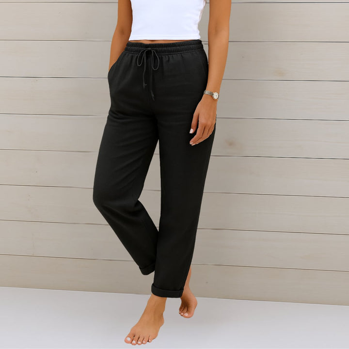 Side view of lightweight elastic waist pants highlighting the clean, elongating silhouette