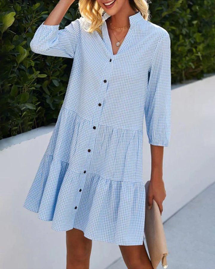 Full-length shot of the Lorraine Summer Check Dress in blue, paired with sandals for a breezy summer outfit